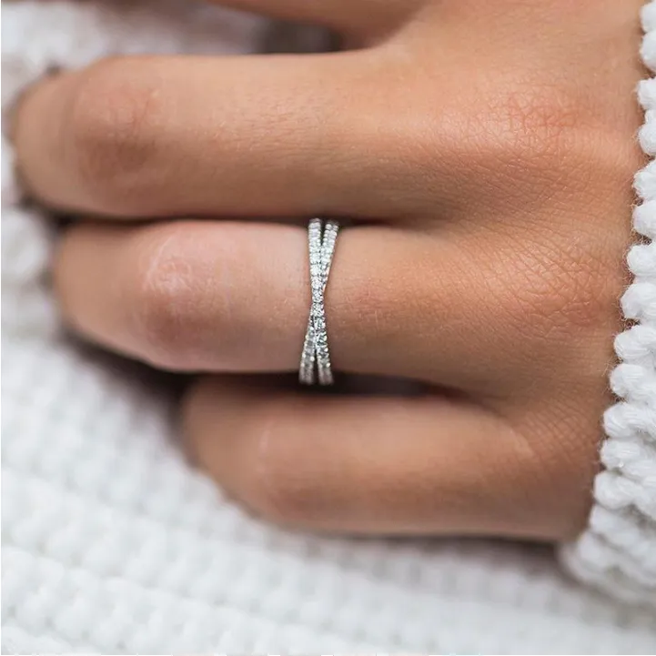 Luxurious Halo Radiant Cut Sterling Silver Bridal Set with Two Interweave Bands